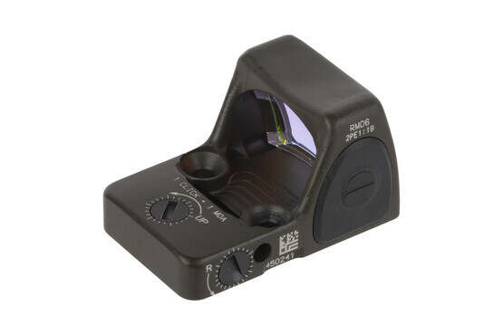 The Trijicon RMR 06 red dot sight has large rubber illumination buttons on the side for easy access
